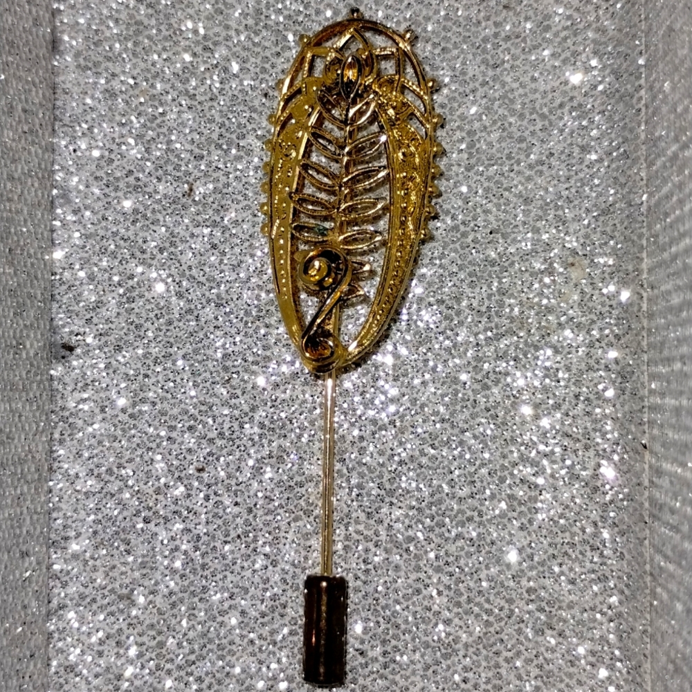 Abstract golden vintage stick pin